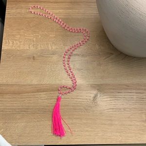 Neon pink tassel necklace